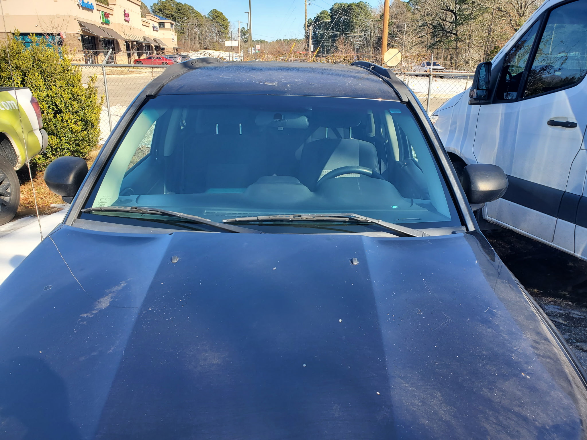 Completed windshield replacement after Champion Auto Glass service