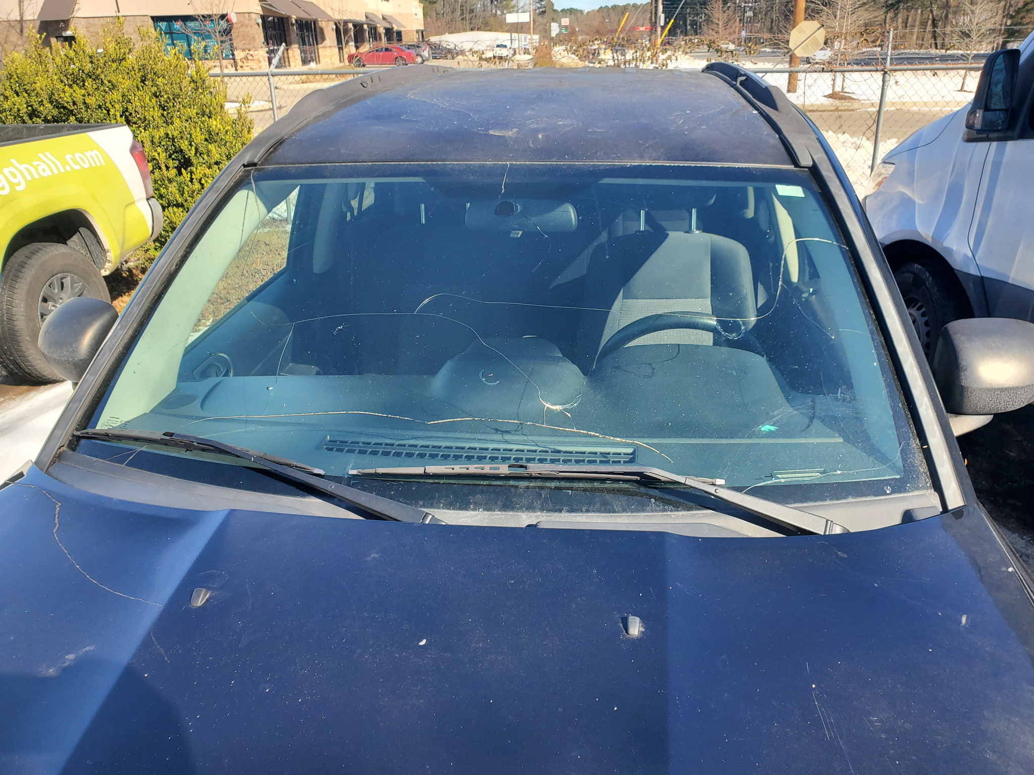Damaged windshield before replacement